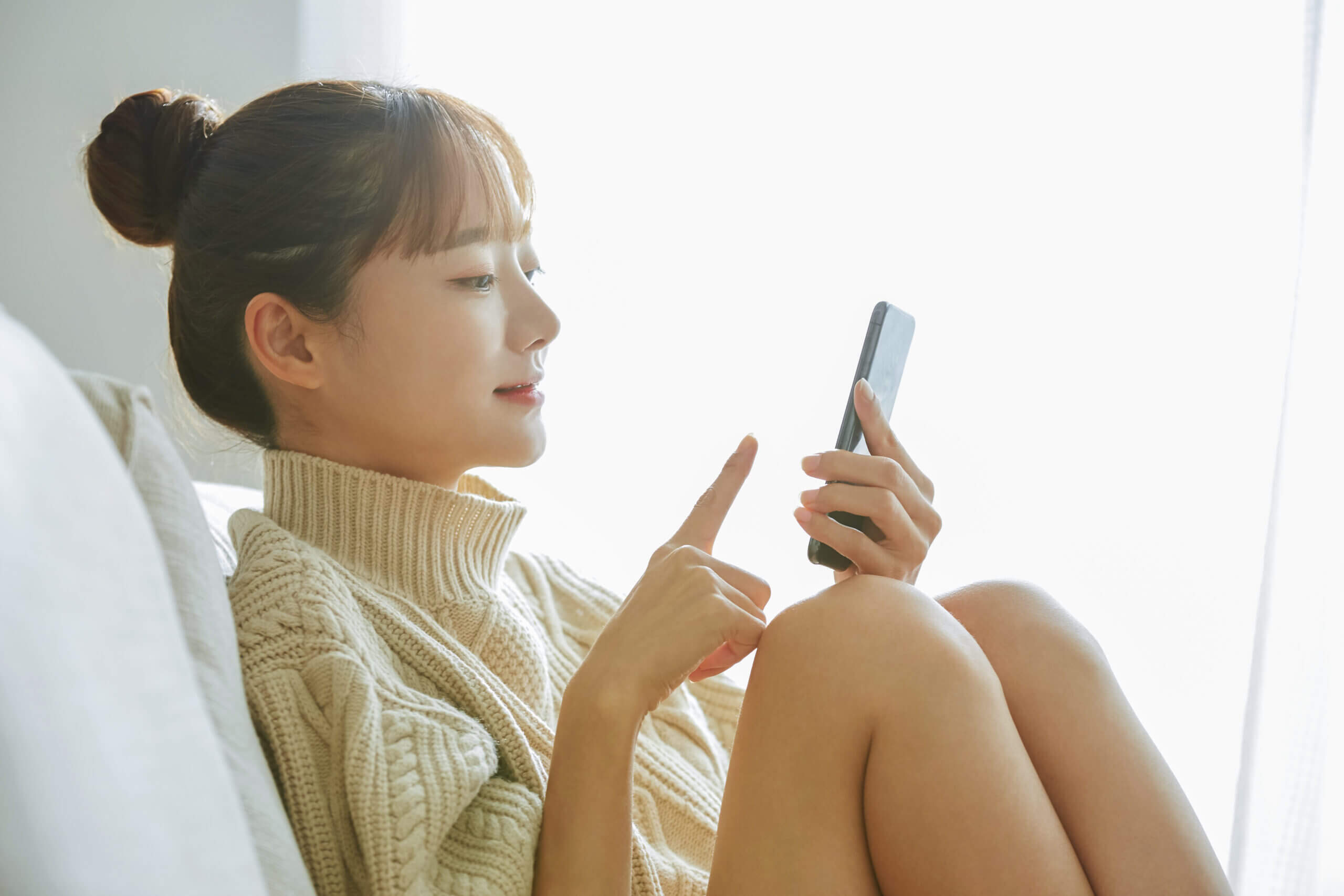 スマホで応募する様子